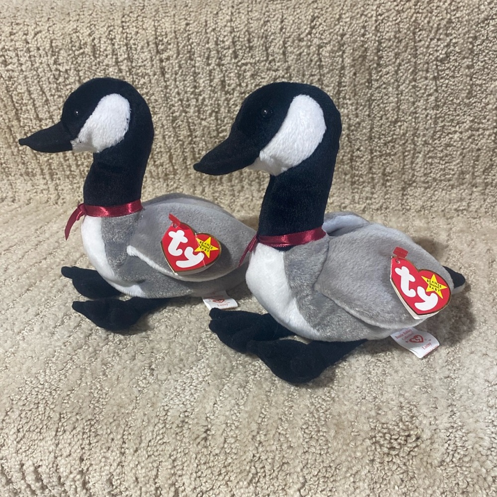 Two Ty Beanie Babies Loosy. Gray, black & white geese.